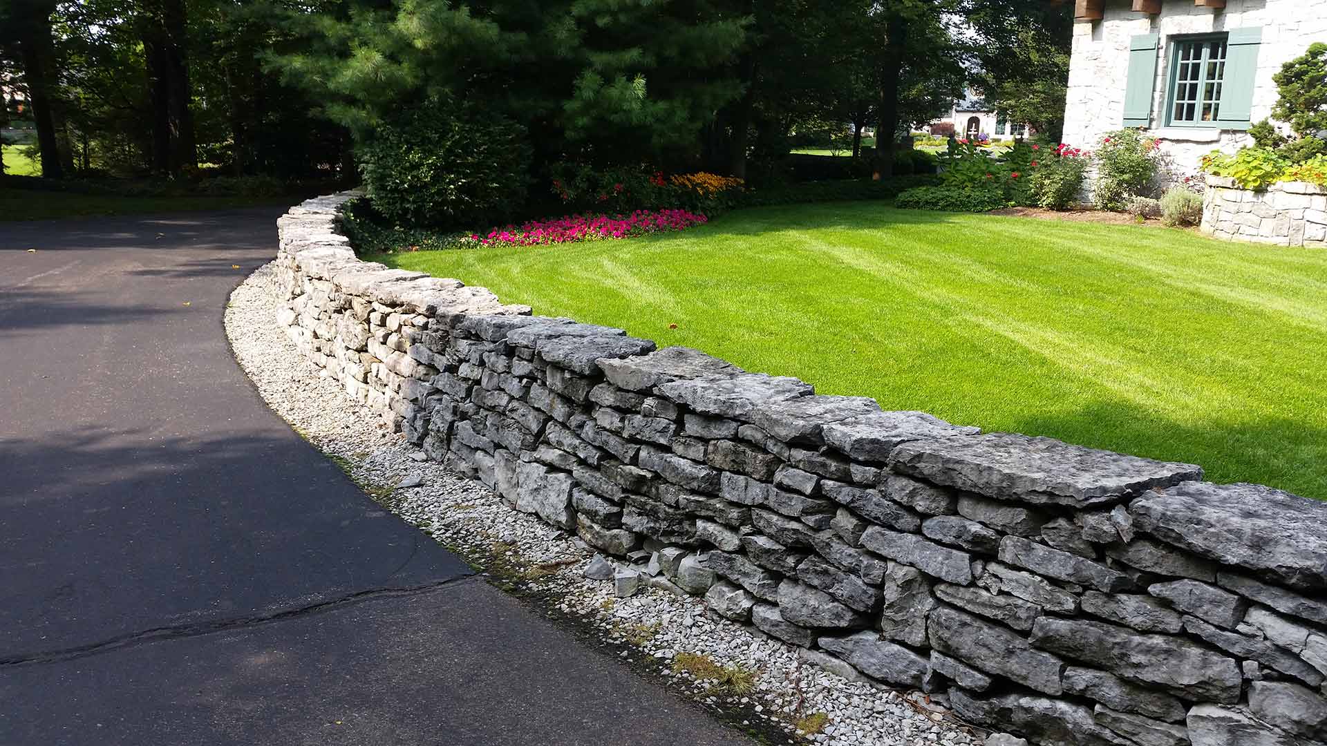 Custom stone retaining wall in East Lansing, Michigan.