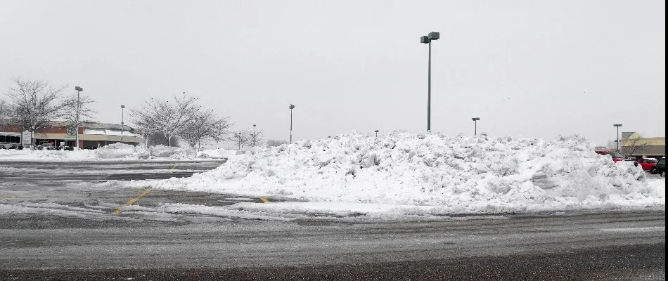Pile of snow in a parking lot in East Lansing, MI.