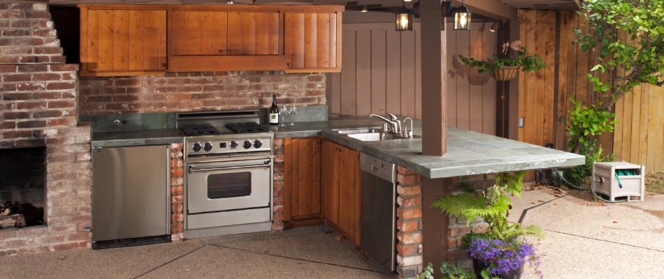 Outdoor kitchen with amenities installed in Haslett, MI.