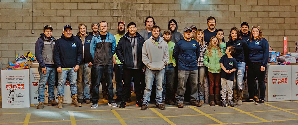 A group photo of our employees and landscapers at a charity event in East Lansing, MI.