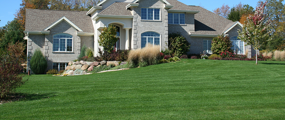 Well maintained home lawn at a property in East Lansing, Michigan.